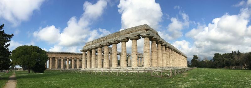 Panoramic view of historical building against cloudy sky