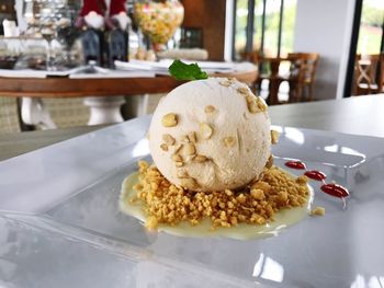 Close-up of ice cream in plate on table