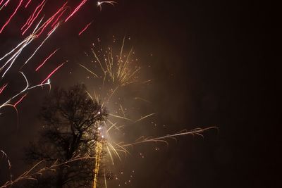 Low angle view of firework display