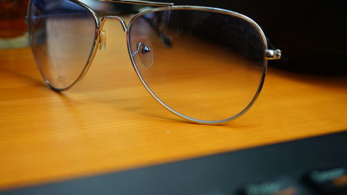 Close-up of sunglasses on table