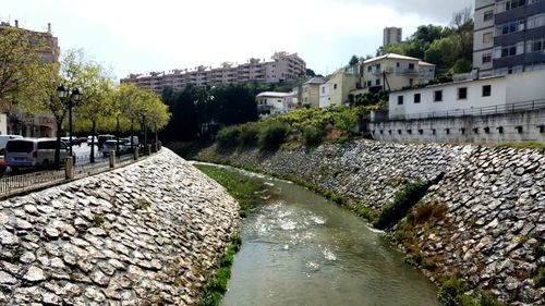 View of canal along buildings