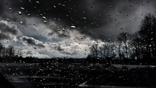 Close-up of wet window in rainy season