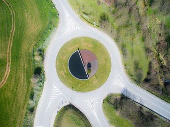 High angle view of road amidst green landscape