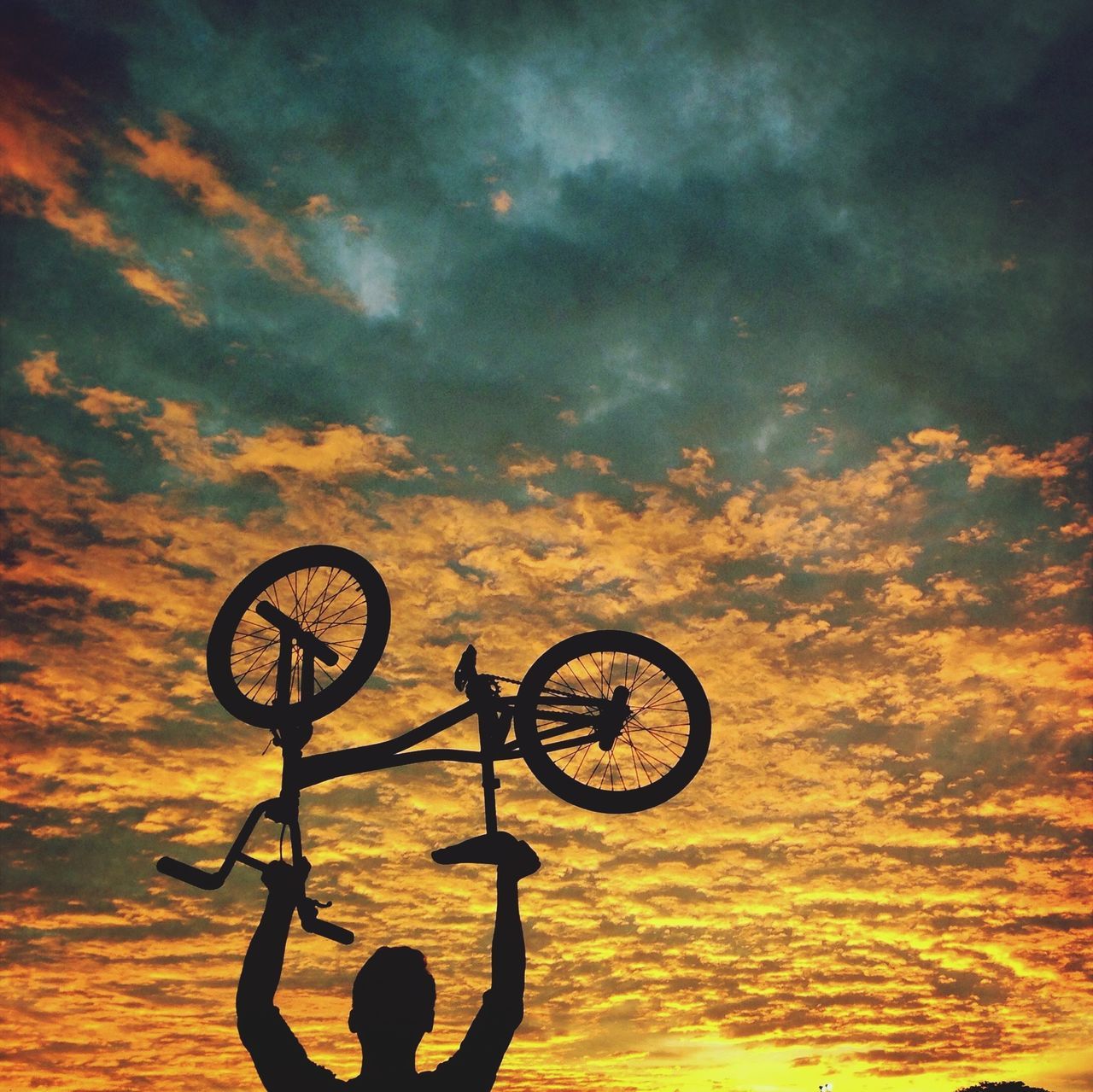 sunset, bicycle, sky, silhouette, cloud - sky, orange color, transportation, cloud, tranquility, sea, beauty in nature, outdoors, cloudy, scenics, leisure activity, mode of transport, nature, tranquil scene