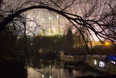 View of canal in city at night