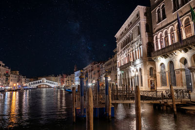 Beautiful view of grand canal and rialto bridge in venice, italy at night