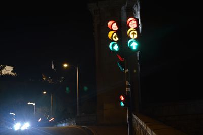 Illuminated road sign at night