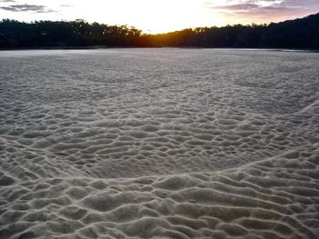 Scenic view of landscape at sunset