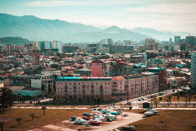 High angle view of buildings in city against sky