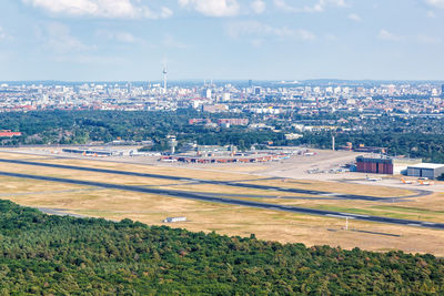 High angle view of buildings in city against sky