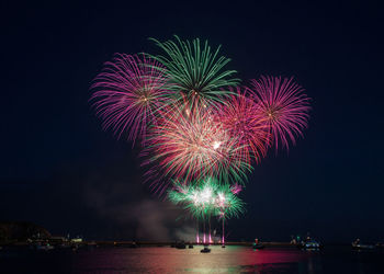 Firework display at night