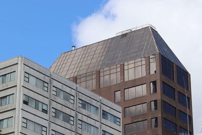 Low angle view of modern building against sky