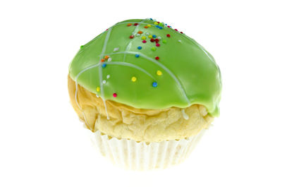 Close-up of cupcakes against white background