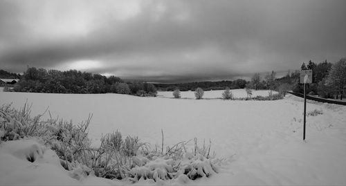 Scenic view of snow covered landscape