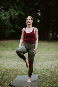 Full length portrait of beautiful young woman