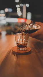 Close-up of wineglass on table