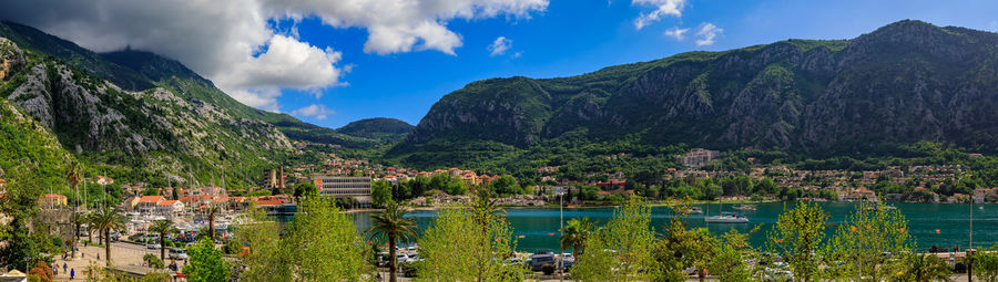 Panoramic view of townscape by sea against sky
