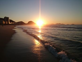 View of beach at sunset