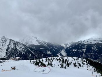 Snow covered mountain against sky