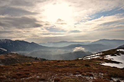 View of landscape against cloudy sky