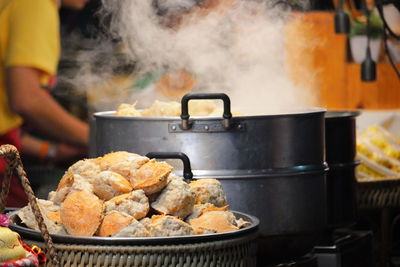 Man preparing food on barbecue grill