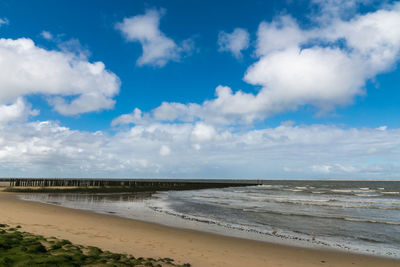 Scenic view of beach against sky