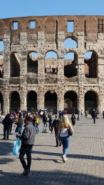 Group of people in front of historical building