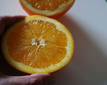 Close-up of hand holding apple