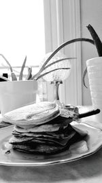 Close-up of table in window at home