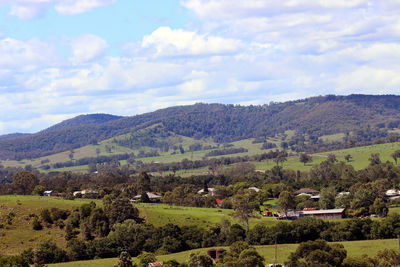 Scenic view of landscape and mountains against sky