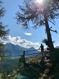 Scenic view of mountains against bright sky