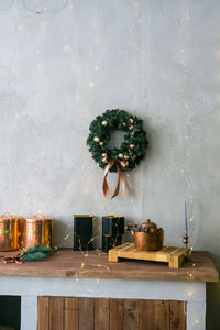 Home new year's kitchen interior. decorations with garlands and a christmas wreath. 