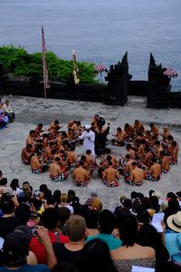 High angle view of group of people on shore