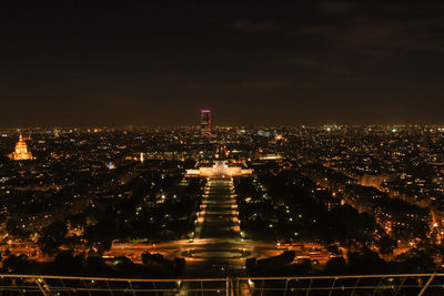 Illuminated buildings in city at night