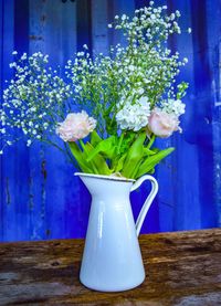 Close-up of flower vase on table