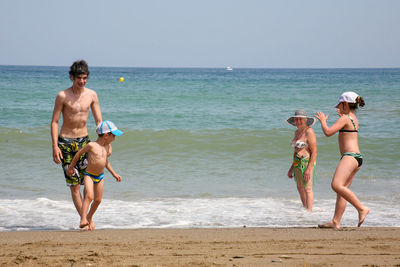 Woman standing on beach