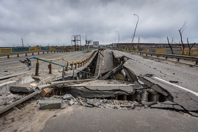 Cities of ukraine after the russian occupation. bridge over the river irpin.