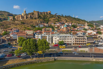 Buildings in city against sky
