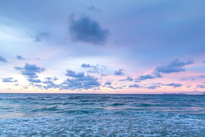 Scenic view of sea against sky at sunset