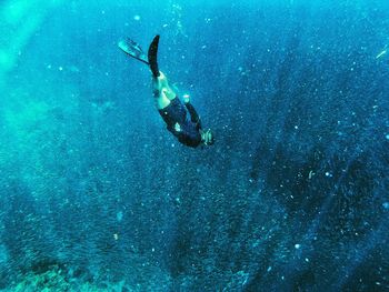 Man swimming in sea