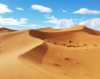 Scenic view of desert against sky