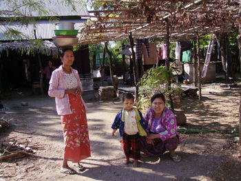 Portrait of smiling girl standing outdoors