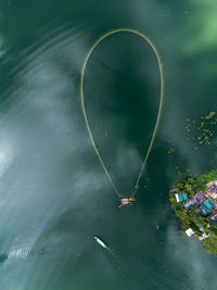 High angle view of leaf floating on lake