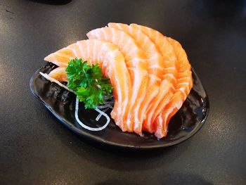 High angle view of fish in plate on table