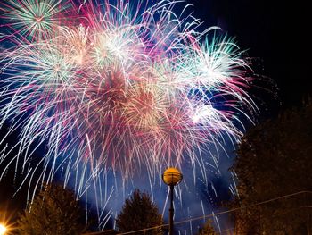 Low angle view of firework display