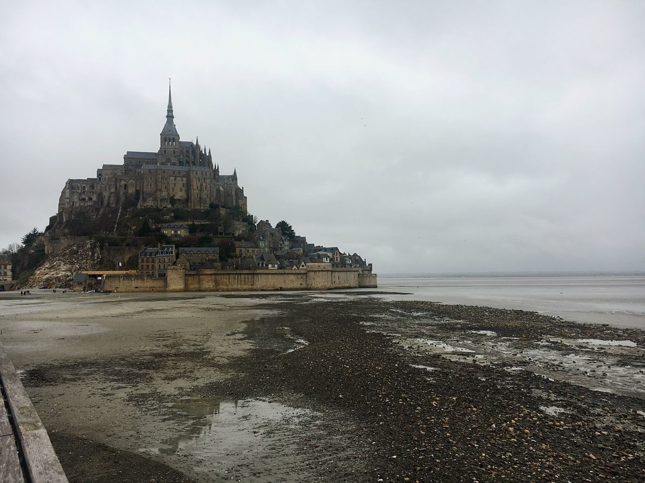 sea, beach, horizon over water, sky, water, built structure, travel destinations, building exterior, architecture, outdoors, tranquility, nature, religion, scenics, day, no people, sand, place of worship, cloud - sky, beauty in nature