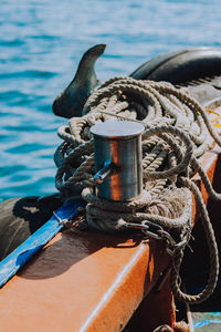 Close-up of rope tied to bollard