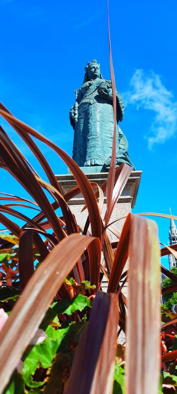 LOW ANGLE VIEW OF METALLIC STRUCTURE AGAINST CLEAR BLUE SKY