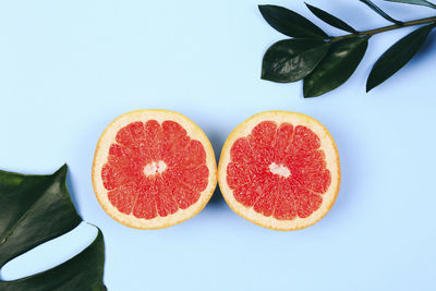 Close-up of strawberries on table against white background