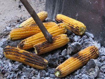 High angle view of meat on barbecue grill